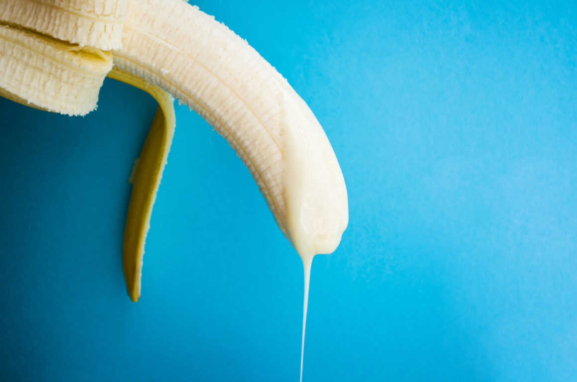 banana with condensed milk, symbolizing a penis with semen