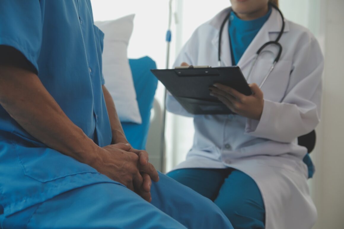 doctor talking to a male patient during a consultation