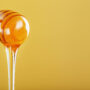 honey dripping from a spoon