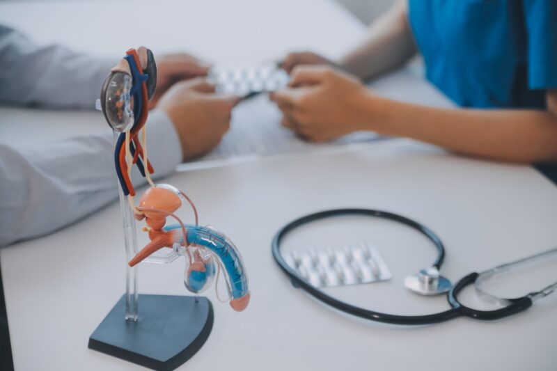 Urologist advising a patient about prostate problems