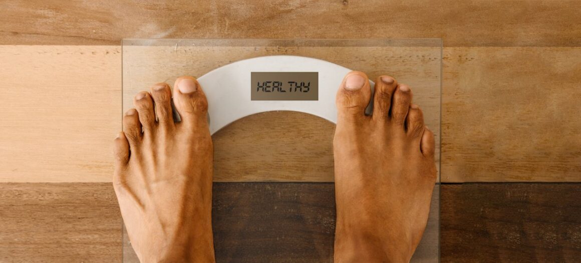 pair of feet on a weight scale