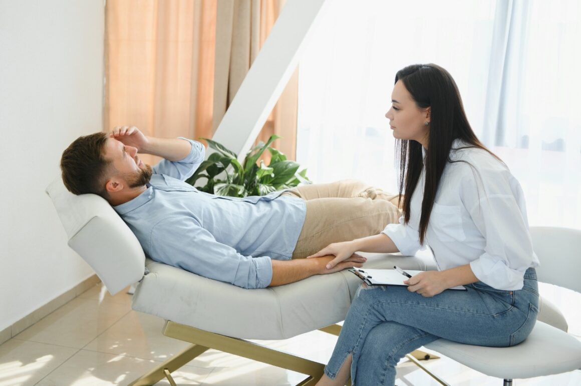 female therapist talking to a patient