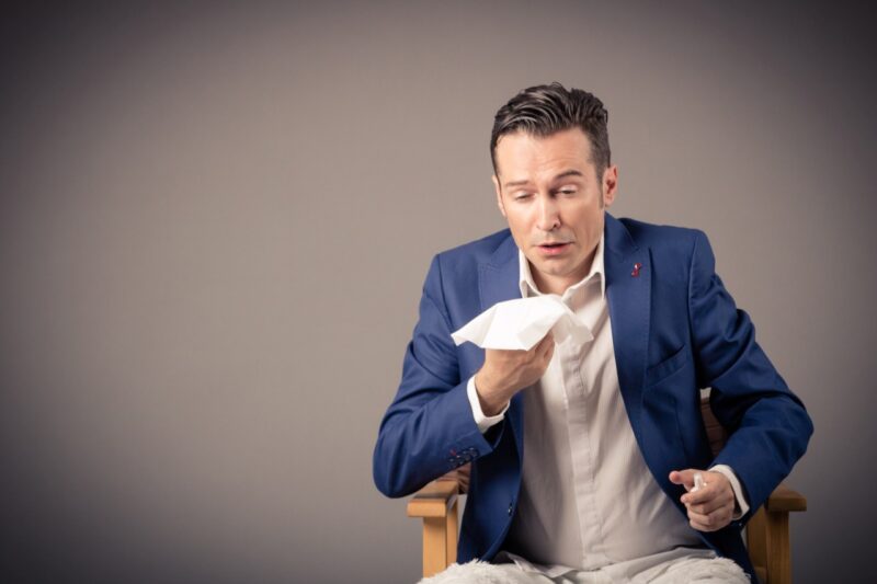 man about too sneeze