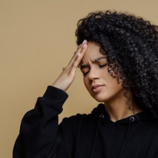 beautiful woman suffering from headache