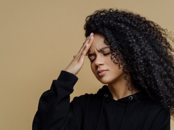 beautiful woman suffering from headache