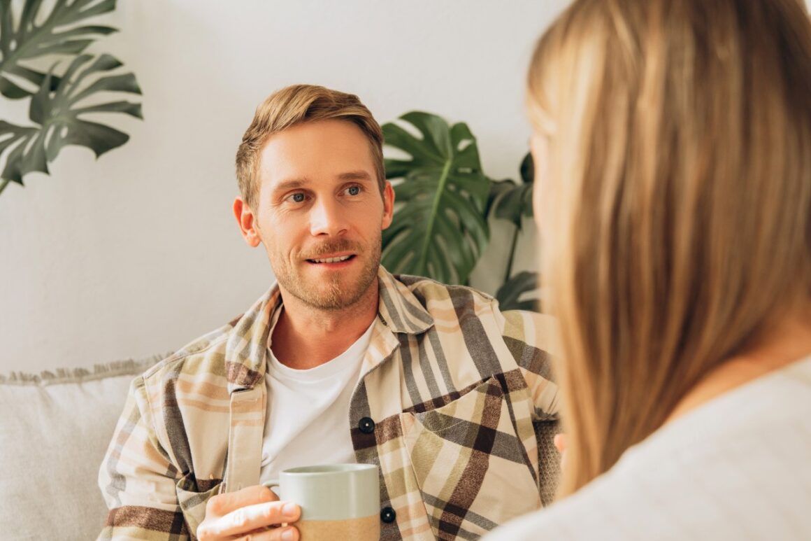 couple talking calmly over a cup of coffee