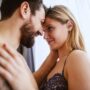 A man and his lady getting intimate in the bedroom