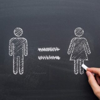 chalk drawing of a man and woman with equal sign in between