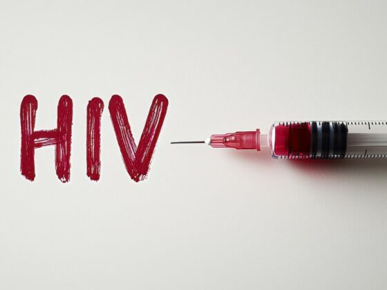 HIV written in red with syringe